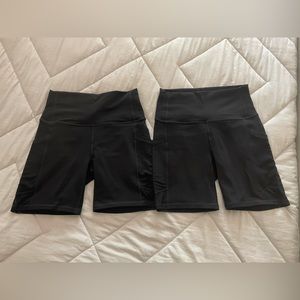NWOT Fabletics Powerhold shorts, size Medium. 2 pairs. Black